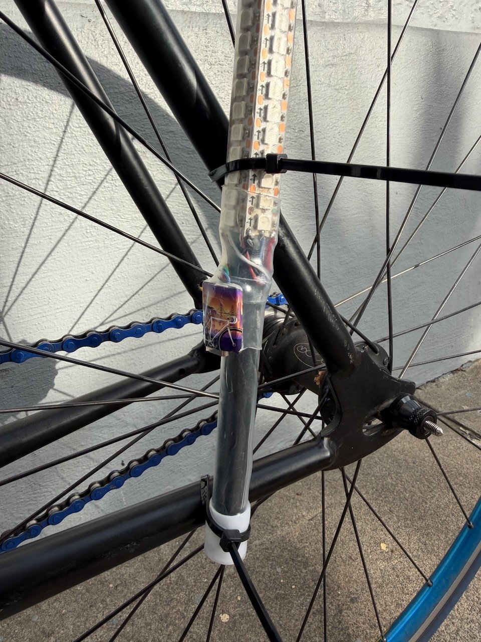 First zip tie securing pole