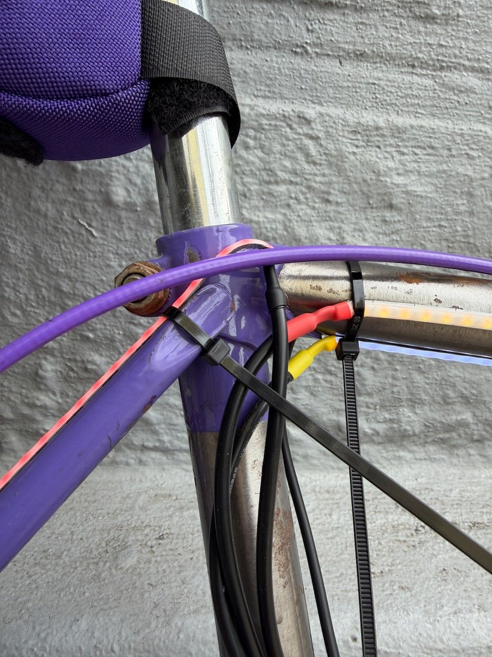 Securing strip with zip tie